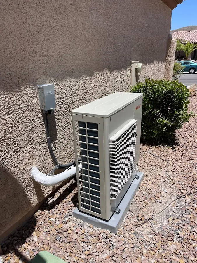 Residential air conditioning condenser unit in Sandwich